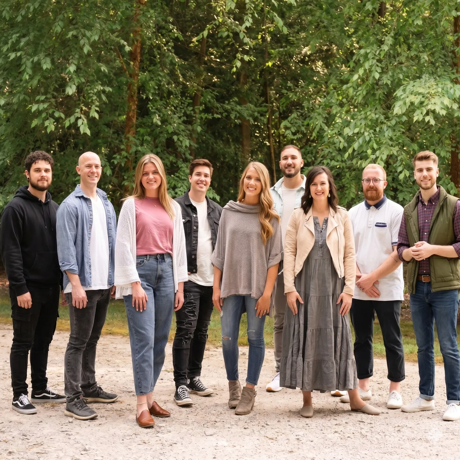 The Red Letter Society collective standing together outdoors